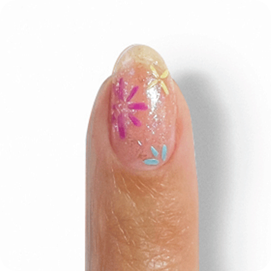  Model showcasing smaller flower motifs made with ride the soundwave and you’re scent-sational essie nail polishes.
