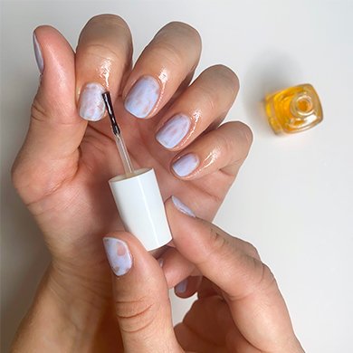 apply essie apricot cuticle oil to cuticles