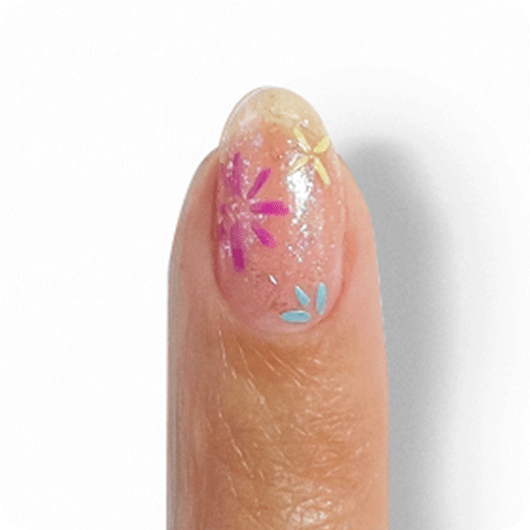 Model showcasing smaller flower motifs made with ride the soundwave and you’re scent-sational essie nail polishes.