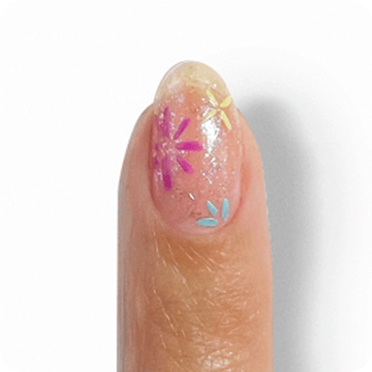 Model showcasing smaller flower motifs made with ride the soundwave and you’re scent-sational essie nail polishes.