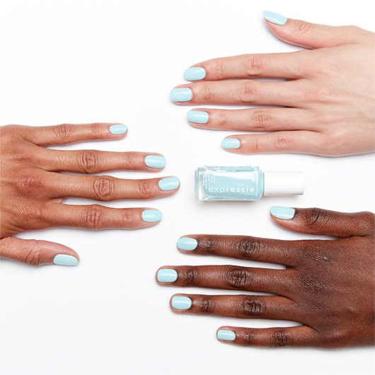 life in 4D blue  nail polish on 3 skintones