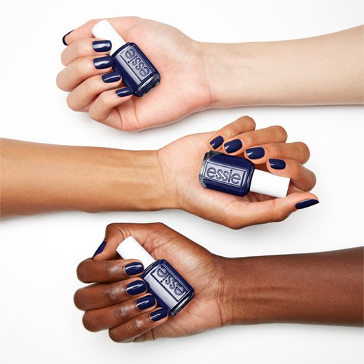 step out of line blue nail polish on 3 skintones