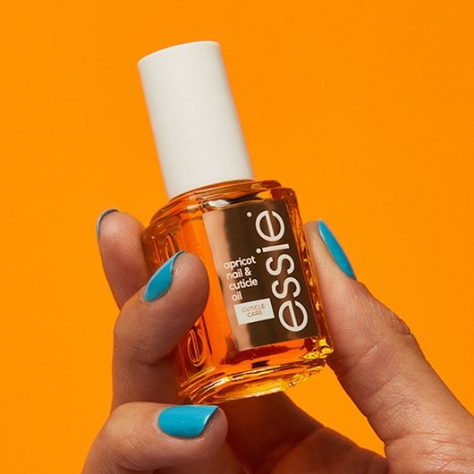 Apricot cuticle oil in a bottle, nourishing moisturizing Essie